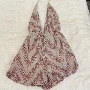 Cream and red romper.